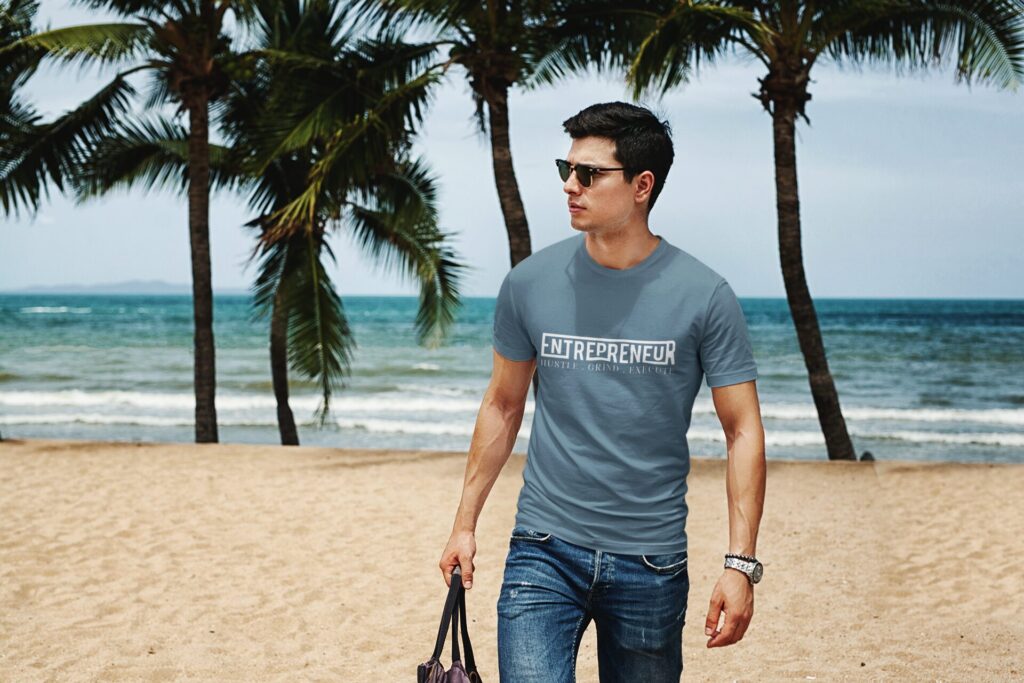 mockup of a man with sunglasses wearing a t shirt at the beach 432 el1 1 1 | Empowering T-Shirts by Quotnair